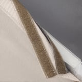 Close-up of a beige bar stool cover with a looped edge, showcasing its removable and washable feature.