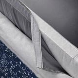 A grey, removable cushion cover for a bar stool, designed to be easy to clean and durable.
