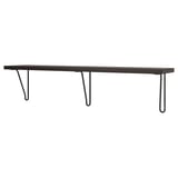 A black BERGSHULT wall shelf with two metal u-shaped brackets.