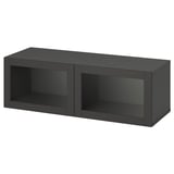 A black ikea BESTÅ storage unit with glass doors and a sleek, rectangular design.