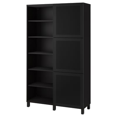 Black BESTÅ bookshelf has open and closed sections, adjustable shelves, and metal mesh doors for modern storage.