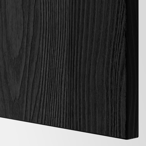 Dark wooden panel close-up. Smooth, even finish with visible grain texture, edge slightly rounded.