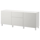 White BESTÅ sideboard with modern design, four legs, two doors, two drawers, and adjustable shelves.