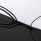 Black glass top panel for storage, with cable outlet for organized management.