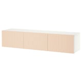 Ikea BESTÅ white tv bench with light wood fluted design.