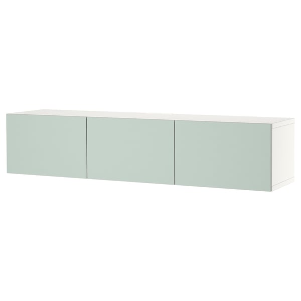 A white BESTÅ tv bench with three light green doors, rectangular shape, and sleek, modern design. It offers storage and cable management.