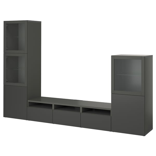 Black BESTÅ tv unit for contemporary living rooms, shelves and drawers for storage. Adjustable shelves, cable management, and sleek design.