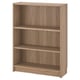 Option: A BILLY bookcase in oak effect. It three adjustable shelves and a simple, rectangular design suitable for various storage needs.