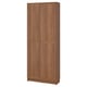 This image shows a BILLY bookcase with wooden doors, featuring a natural oak finish, rectangular shape, and adjustable shelves.