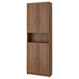 A wooden BILLY bookcase with closed and open storage, designed for versatile use, featuring a warm brown finish.