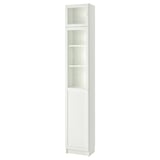 A tall, white BILLY bookcase with glass and solid doors, designed for both display and storage.