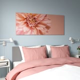 BJÖRKSTA wall art, peach flower, above bed, soft feel.