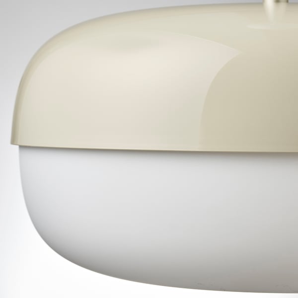 Modern, white pendant lamp with smooth curves.