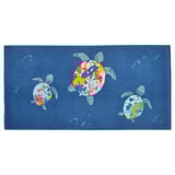 Blue turtle towel with colorful shells, rectangular shape, soft cotton.