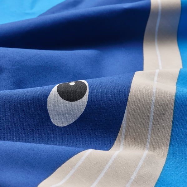 Soft blue duvet cover with a playful fish eye print, made from quality cotton and lyocell blend.