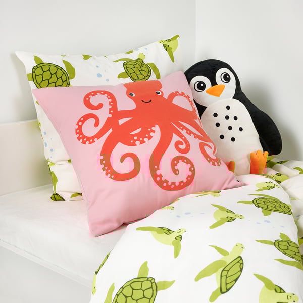 A colorful bedding set featuring an octopus pillow and turtle-patterned duvet cover, ideal for childrens comfort and easy care.