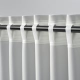 Insulated block-out curtains with hidden tabs.
