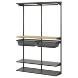 An IKEA BOAXEL dark grey wall-mounted storage system with shelves, hanging rail, and mesh baskets.