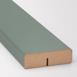 Close-up of sleek, modern teal kitchen cabinet front, showing smooth surface and sturdy edge in natural wood.