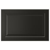 A black, rectangular BODBYN drawer front with a smooth, bevelled panel design made of fibreboard and polyurethane paint.