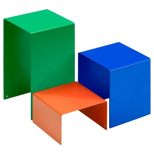 Three colourful geometric stands: green, blue, orange. Modern, minimalist object display.