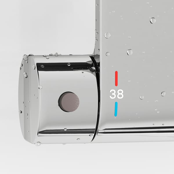 Stainless steel shower mixer with water droplets, featuring 38°c safety stop and override button, illustrating functionality.