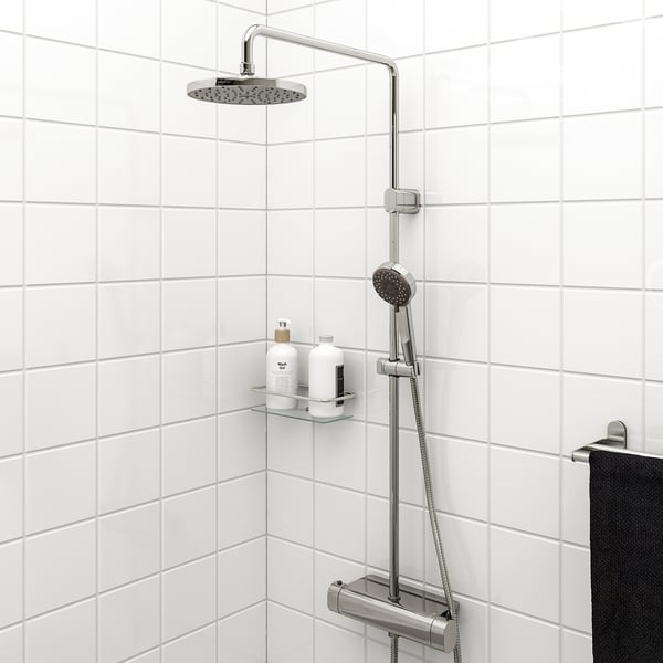 BROGRUND shower combo: chrome, large overhead and handheld sprays, safe design, white-tiled wall, minimalist style.