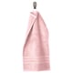 Light pink organic cotton towel with a woven border hangs neatly on a silver hook. Soft, absorbent, and elegant.