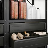 Steel storage unit with adjustable shelves. Holds gas cans, jugs, & cleaning supplies.