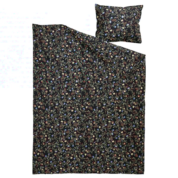 The BRUDKRUSBÄR duvet set black organic cotton with colorful floral prints, ideal for comfy, eco-friendly bedding.