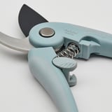 Gardening tool BRYTBÖNA secateurs, light blue, stainless steel blades, ergonomic handles, safety lock.