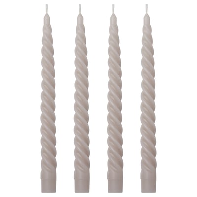 Four grey spiral candles in a row, each twisted and tall, made of paraffin and plant wax, standing upright.