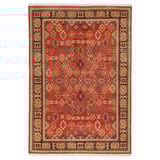 A red DOFTMYSKGRÄS rug with intricate floral patterns and traditional persian design.