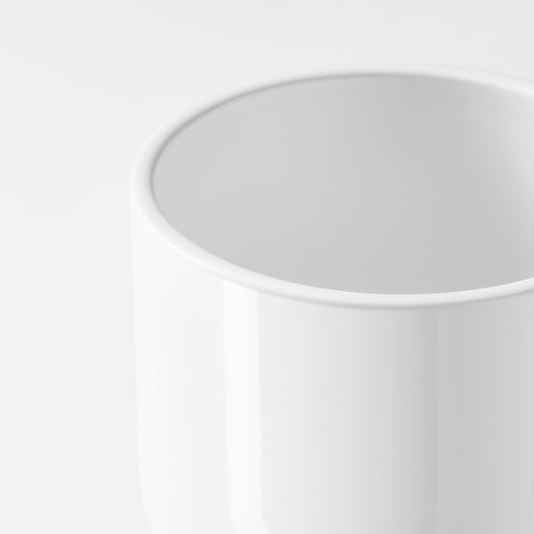 Sleek, modern white planter with smooth, glossy finish; perfect for stylish home decor.