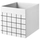 Option: A white dróna fabric storage box with black grid patterns, featuring a square shape and integrated handles for easy access.