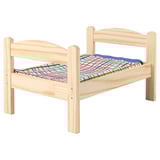 Wooden kids doll bed with colorful bedding.