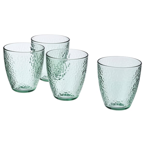 Four green recycled glass cups with a hammered texture design, arranged in a row.