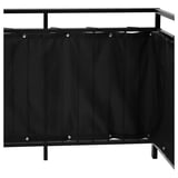 Black balcony privacy screen by DYNING with vertical panels and metal frame for wind and sun protection.