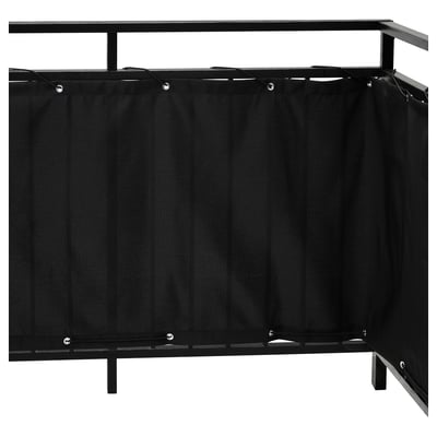 Black balcony privacy screen by DYNING with vertical panels and metal frame for wind and sun protection.