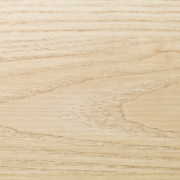 Close-up of a smooth, light-colored wooden surface, likely a kitchen worktop, showcasing its sleek, easy-to-clean, and polished texture.