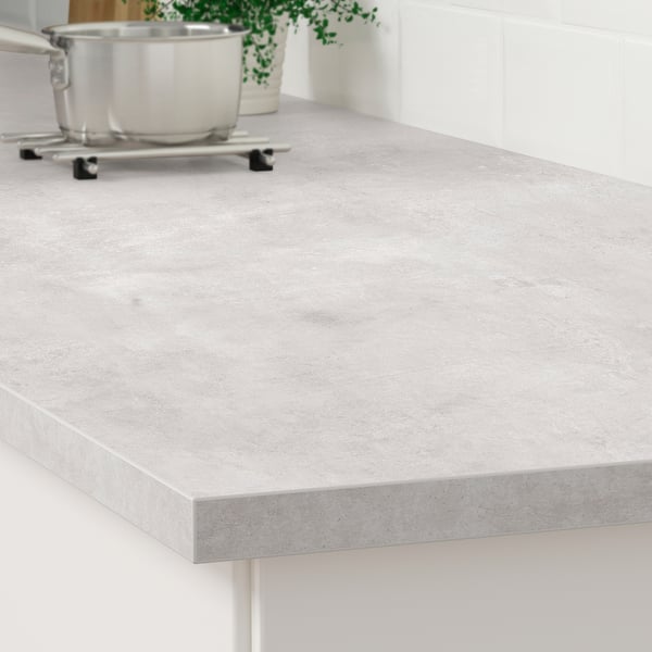 Kitchen countertop, durable, easy-clean laminate, custom sizes, showcasing clean, modern look.