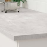 Kitchen countertop, durable, easy-clean laminate, custom sizes, showcasing clean, modern look.