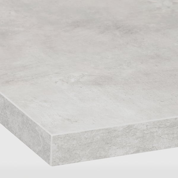 Modern kitchen countertop close-up, smooth, glossy white, clean edges.