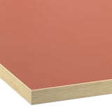 Close-up of a smooth, vibrant orange laminate worktop, showcasing its clean edges and quality finish.