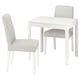 A white EKEDALEN dining set. It includes a square, extendable table and two matching fabric chairs.