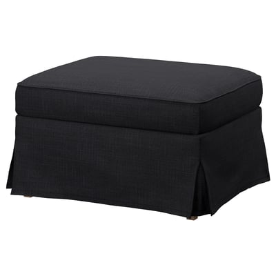 Dark grey EKTORP footstool, rectangular with ruffled edges, soft cushioned top.