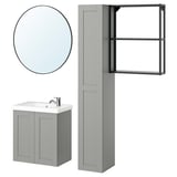 This image a light gray ENHET bathroom set including a tall cabinet, shallow vanity with basin, circular mirror, and wall-mounted shelf.