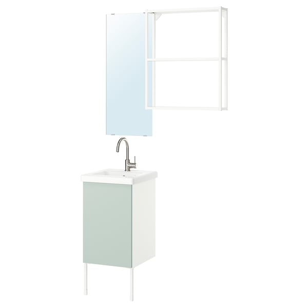 ENHET bathroom set: light green cabinet, white sink, chrome faucet, mirror, wall frame.