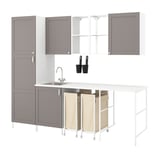Modern grey kitchen setup with cabinets, open shelves, sink, and laundry bags.