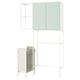 A white ENHET laundry storage unit with green doors, featuring open shelves and a hanging laundry bag.